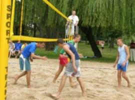 "Otwarty turniej siatkówki plażowej".